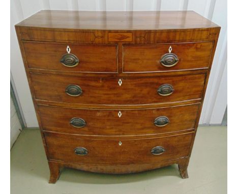 A Victorian rectangular mahogany bow fronted chest of drawers with brass swing handles on four bracket feet, 112 x 100 x 52cm