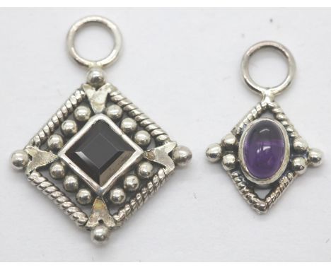Two silver stone set pendants (one garnet, one amethyst). P&amp;P Group 1 (£14+VAT for the first lot and £1+VAT for subsequen