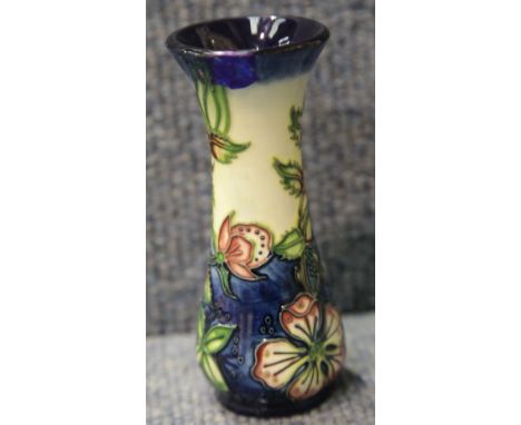 Moorcroft urn/vase in the Pink Hibiscus pattern, H: 13 cm. P&amp;P Group 1 (£14+VAT for the first lot and £1+VAT for subseque