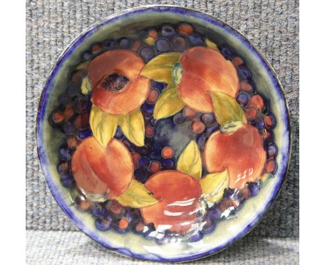 Moorcroft signed shallow bowl in the Blue Pomegranate pattern, D: 18 cm. P&P Group 1 (£14+VAT for the first lot and £1+VAT fo