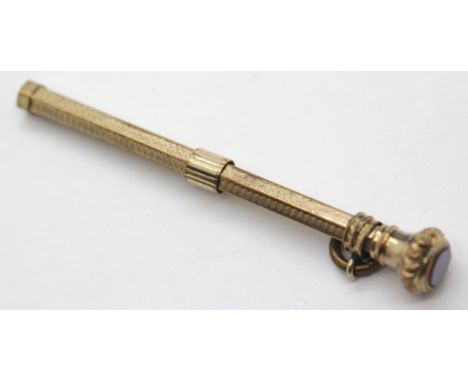 Small unmarked yellow metal retractable pencil, L: 7 cm (extended), 4.1g. P&amp;P Group 1 (£14+VAT for the first lot and £1+V