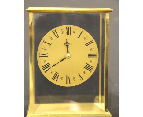 Brass Garrard quartz mantel clock, H: 12 cm. P&P Group 1 (£14+VAT for the first lot and £1+VAT for subsequent lots) 