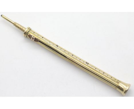 Presumed gold retractable pencil with bloodstane intaglio (Liver Bird?) seal and ruler markingsto 1/8 inch to one side. Only 