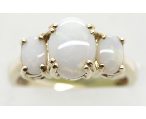 Ladies 9ct gold three stone claw set opal ring, size L, 3.6g. P&amp;P Group 1 (£14+VAT for the first lot and £1+VAT for subse