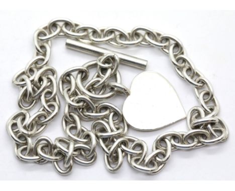 Silver solid oval link T-bar and heart necklace, 30g. P&amp;P Group 1 (£14+VAT for the first lot and £1+VAT for subsequent lo