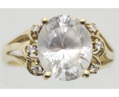 14ct gold white stone solitaire ring with stone set surround, size R/S, 5.2g. P&amp;P Group 1 (£14+VAT for the first lot and 