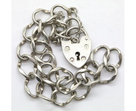 Vintage solid silver charm bracelet with padlock and safety chain. P&amp;P Group 1 (£14+VAT for the first lot and £1+VAT for 