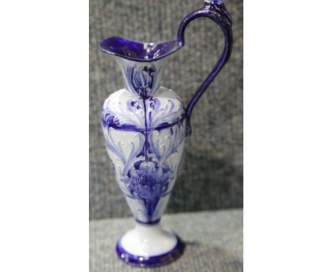 Moorcroft ewer/jug signed W Moorcroft with Macintyre stamp. No chips or cracks H: 22 cm  P&P Group 2 (£18+VAT for the first l