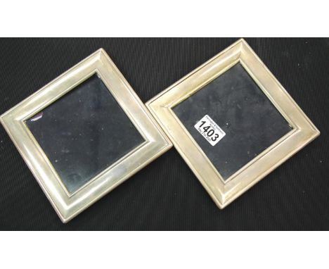 Two modern square silver photo frames.15 cm sq P&amp;P Group 1 (£14+VAT for the first lot and £1+VAT for subsequent lots) 