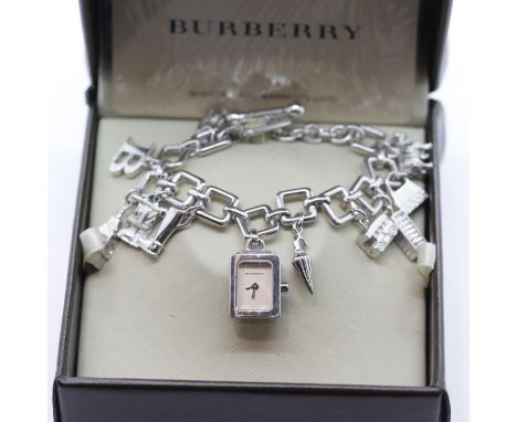 Ladies Burberry silver charm bracelet with 12 assorted charms, 1 watch charm, RRP £500.00. P&amp;P Group 1 (£14+VAT for the f