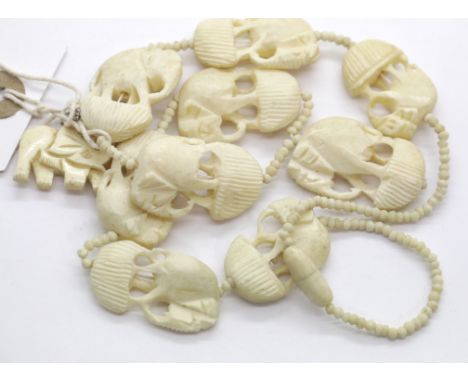 Antique hand carved elephant necklace. P&amp;P Group 1 (£14+VAT for the first lot and £1+VAT for subsequent lots) 