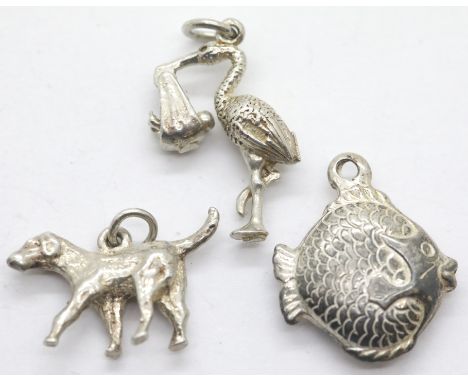 Three 70s solid silver charms. P&amp;P Group 1 (£14+VAT for the first lot and £1+VAT for subsequent lots) 