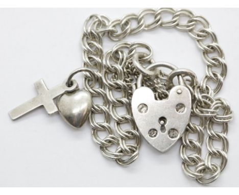 Silver 1970s double link charm bracelet with safety chain and padlock. P&P Group 1 (£14+VAT for the first lot and £1+VAT for 