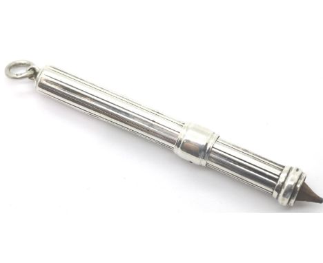 Hallmarked silver retractable chatelaine pencil. Lion passant to collar and no other marks L: 8.5 cm.  P&amp;P Group 1 (£14+V