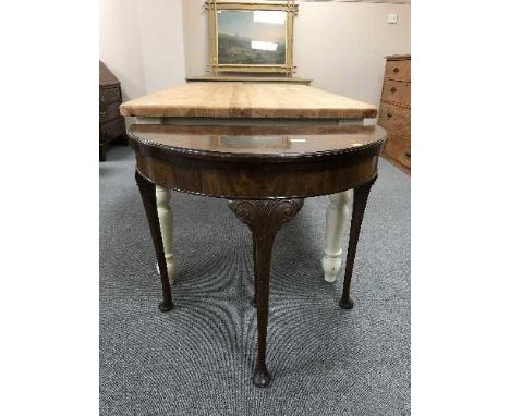A mahogany d-shaped TOT card table 