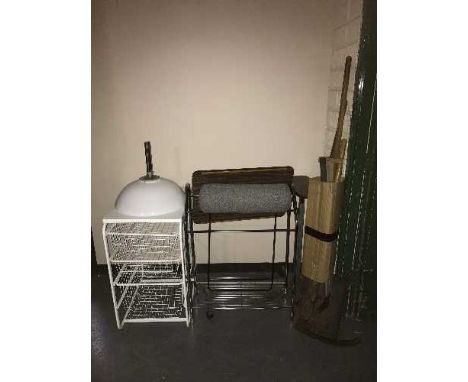 A bundle of garden tools, hand basin, bed tray, three drawer metal rack, towel rail and a head rest 