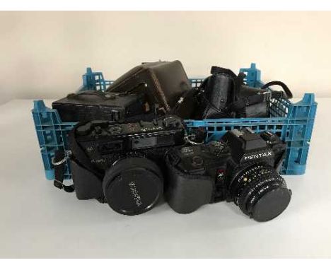 A box of assorted cameras - Microcord Rollei camera in leather case, Pentax, Yashika, Halina etc 