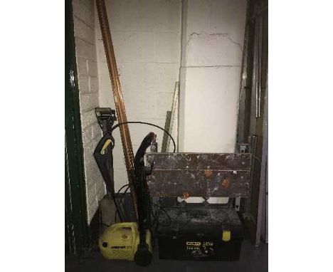 A work bench, tool box and tools, Karcher pressure washer, spirit levels, seven lengths of copper piping 