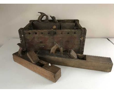 A wooden crate of vintage hand tools, wood working planes etc 