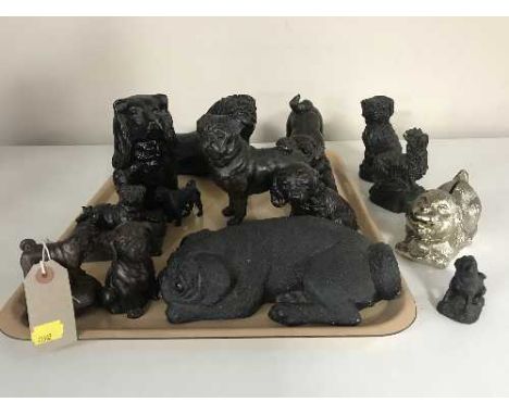 A tray of quantity of assorted resin figures of dogs and a metal dog money box 