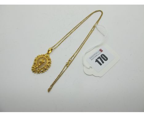 An Indian High Carat Pendant, of shaped pierced and textured design, stamped "22C", on a fine chain with hook and loop fasten