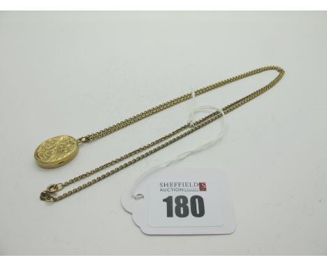 A 9ct Gold Oval Locket Pendant, leaf scroll engraved, on a 9ct gold chain (overall weight 9grams). 