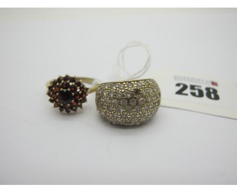 A 9ct Gold Bombé Style Ring, pave set (one missing) (finger size K/L); Together with A Large 9ct Gold Cluster Ring, claw set 