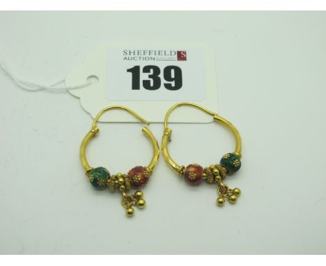 A Pair of Indian High Carat Hoop Earrings, highlighted in enamel. 