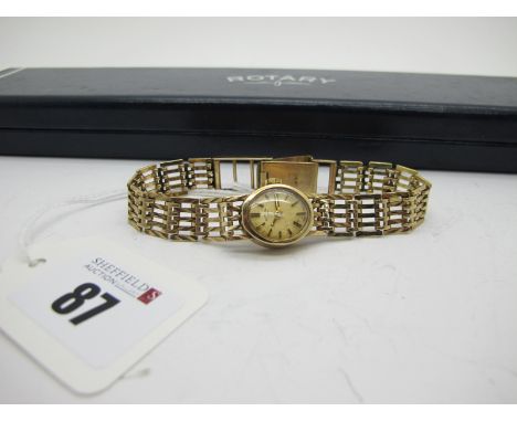 Rotary; A 9ct Gold Cased Ladies Wristwatch, the signed dial with line markers, within plain case, to integral bracelet (overa
