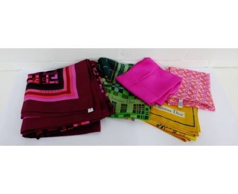 A collection of four Christian Dior head scarves, together with a Givenchy scarf and an Escada Especially scarf and two Chris