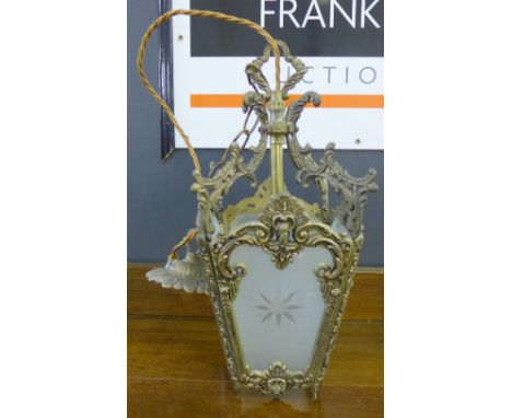 An opaque glass and brass hanging lantern light fitting, approx 36cm long
