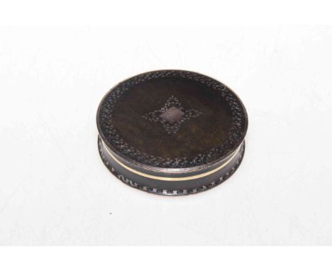19th Century gold inlaid tortoiseshell circular snuff box, bearing crest.