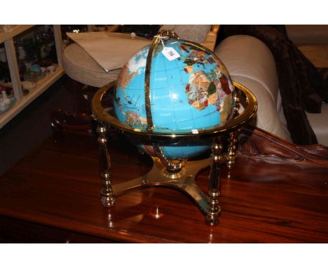 Brass and semi-precious stone terrestrial globe.