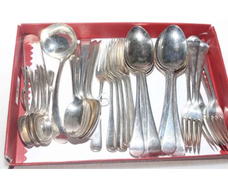 Silver Old English pattern flatware, comprising tablespoons, table forks, desert spoons and forks, ladle, teaspoons and tongs