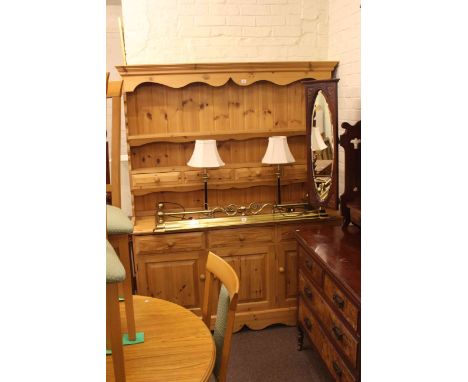 Pine three door dresser with shelf and spice drawer back.