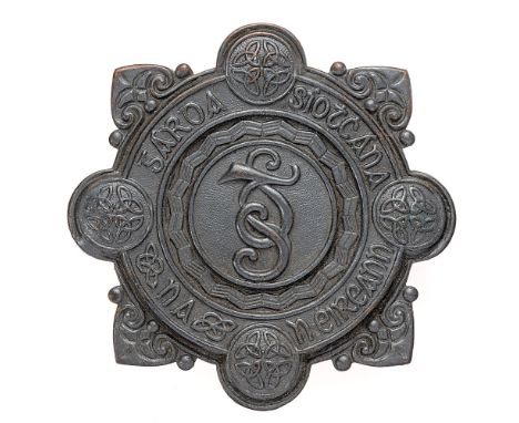 Irish Police (Garda Siochana) night helmet plate badge circa 1922-40.  Good scarce die-stamped blackened metal with first pat