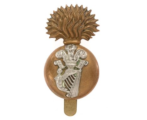 Princess Victoria (Royal Irish Fusiliers) Edwardian Brodrick cap badge circa 1902-05.  Good scarce die-cast brass flaming gre