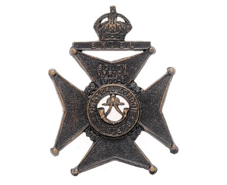 22nd Middlesex, Central London Rangers cap badge circa 1905-08 only.  Scarce die-stamped blackened brass crowned EXCEL tablet