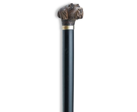 A 20th century walking cane with gundog finalpossibly a German Wirehaired PointerCarved wood with glass eyes, metal collar, e