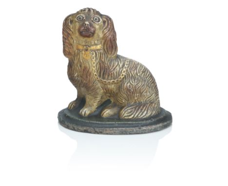 An English polychrome fireclay model of a Spaniel Mid-19th century Probably Nottinghamshire or Derbyshire, modelled wearing a