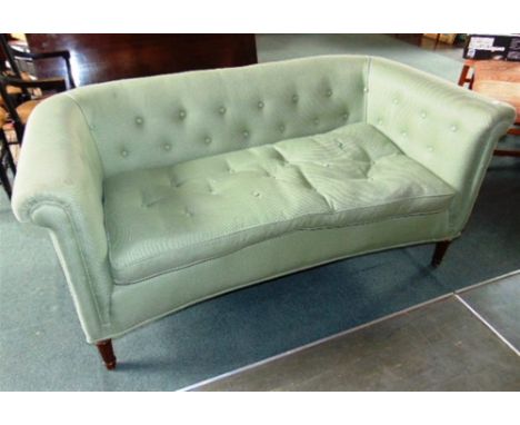 A BUTTON UPHOLSTERED TWO SEATER SOFA,  with concave shaped front and scroll arms, on turned and fluted supports, 155cm wide 8