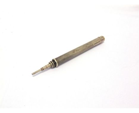 A SILVER PROPELLING PENCIL Birmingham 1894, engine turned decoration 