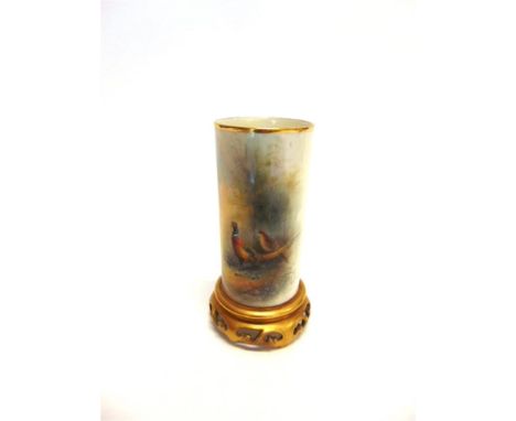 A ROYAL WORCESTER STINTON DECORATED SLEEVE VASE  of cylindrical form on pierced gilded foot, painted decoration of pheasants 