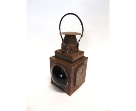 A LONDON TRANSPORT BULLS-EYE TAIL LAMP complete with reflector, B.R. burner and reservoir (later painted).