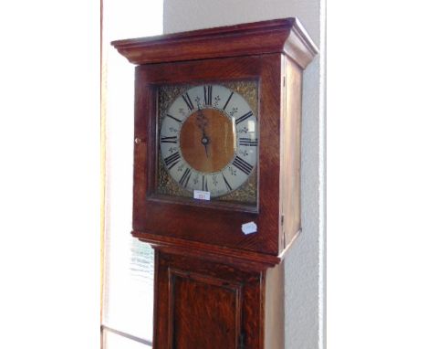 AN OAK CASED 30-HOUR LONGCASE CLOCK,  the brass 10' dial with single hour hand inscribed 'tho. Endersby Potton', the door wit