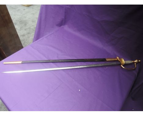 A possible 18th/19th century Small/Court Sword with leather and metal scabbard, brass hilt with wired grip, highly decorated 