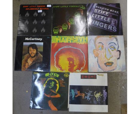 A collection of LP records including Stiff Little Fingers, Bob Dylan and Paul McCartney 