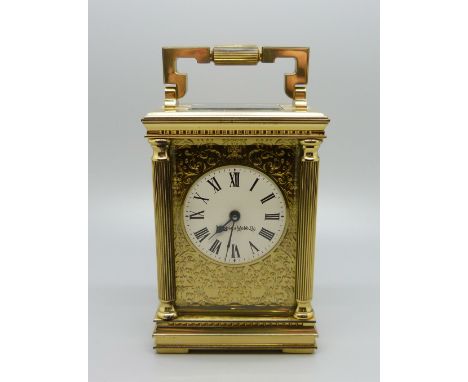 A Mappin &amp; Webb brass and four glass sided carriage clock 