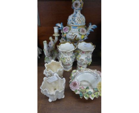 A pair of florally encrusted vases, lidded pot, basket and candlestick, a/f and a pair of vases&nbsp;**PLEASE NOTE THIS LOT I