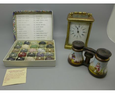 A carriage clock, glass a/f, a pair of binoculars and a set of 25 semi-precious stone eggs 